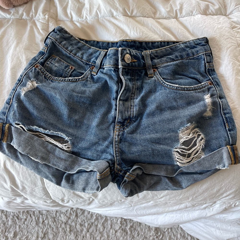 Blue denim shorts.